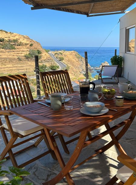 Tinyhouse with seaview from the terrace in the morning