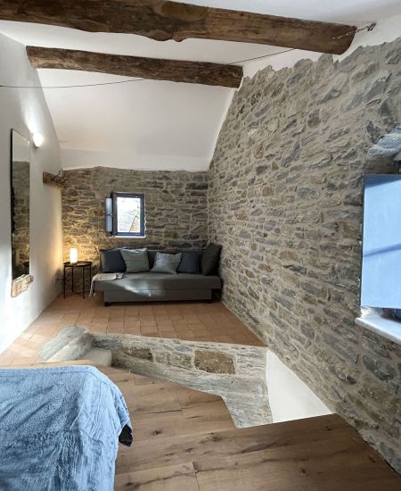 livingroom an kitchen in the traditional ikarian stonehouse