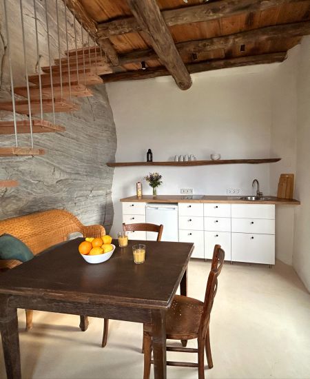 livingroom an kitchen in the traditional ikarian stonehouse